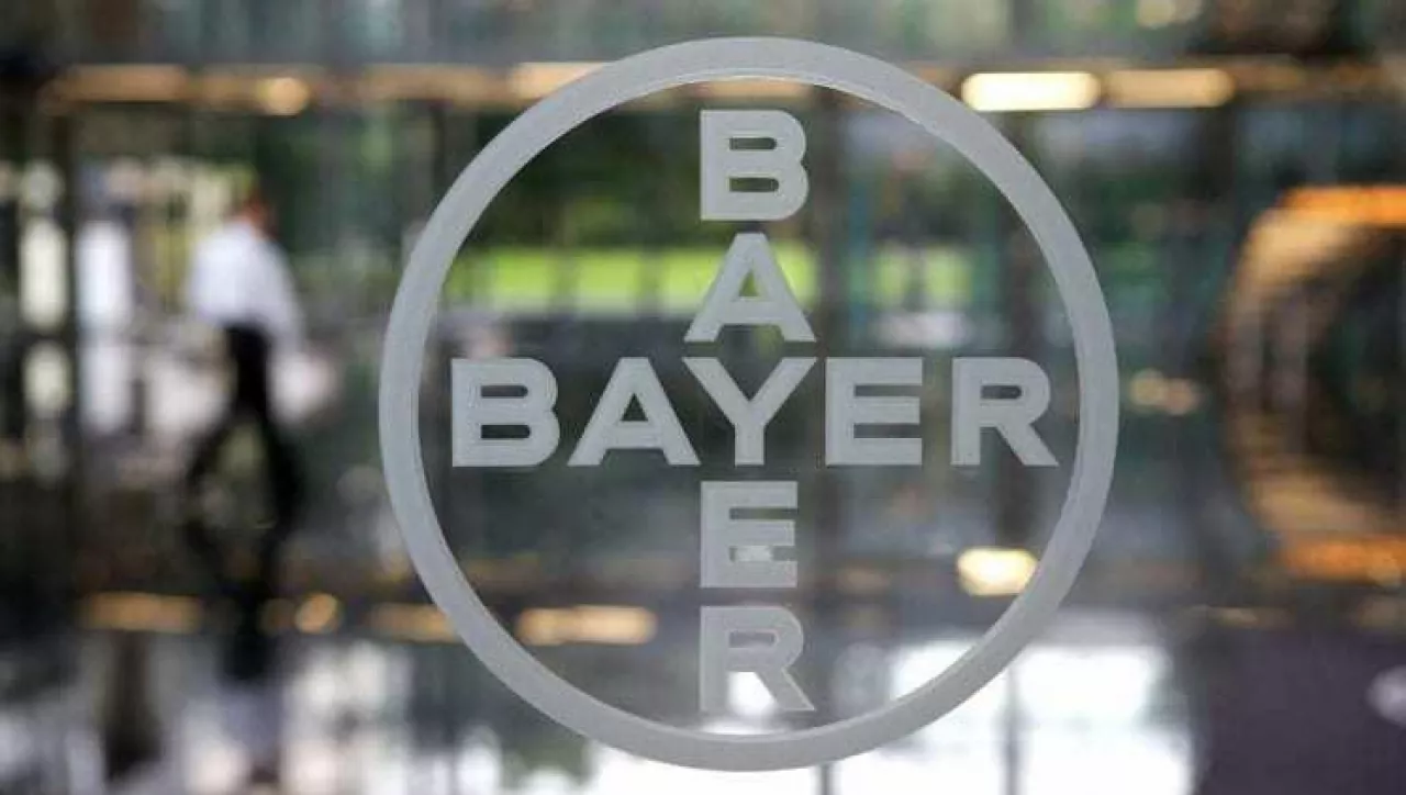 GERMANY - SEPTEMBER 18: The logo of Bayer AG is seen at the entrance of the company‘s headquarters in Leverkusen, Germany, on Wednesday, Sept. 17, 2008. Speculation continues that Pfizer Inc. will bid for the company. (Photo by Wolfgang Von Brauchitsch/Bloomberg via Getty Images)