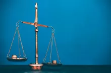 Balance scale with coin stacks. Money management, time value of money and saving money concept.