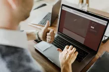 Businessman and his laptop in the office