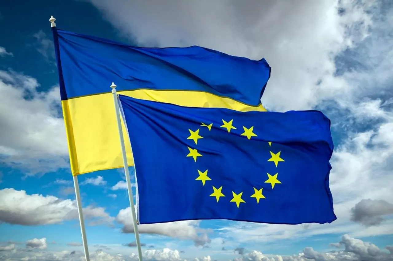 Ukrainian blue and yellow bicolor national flag on blue sky background. Ukraine fight for Freedom concept