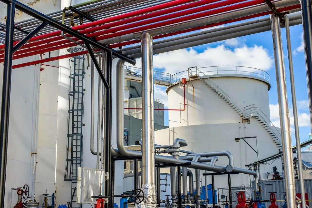 Storage tanks and industrial piping at biofuel plant